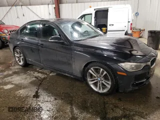2012 BMW 3 Series 335i with VIN WBA3A9C55CF474823, listed as a Copart auction lot 87766325 with 146,985 mi miles and Salvage title. Bid and sale history available at DreamBid. Image 4.