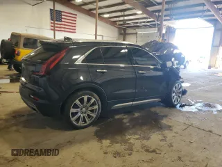 2023 Cadillac XT4 AWD Premium Luxury z VIN 1GYFZDR47PF209282, wystawiony jako Copart lot #51175635 z przebiegiem Nie podano mil oraz Szkoda całkowita • Salvage title. Historia ofert i sprzedaży dostępna na DreamBid. Obrazek 3.