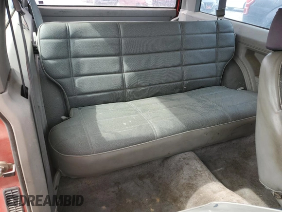 1993 Jeep Cherokee SE with VIN 1J4FT27P2PL619945, listed as a Copart auction lot 59053465 with 222,336 mi miles and Clean title. Bid and sale history available at DreamBid. Image 10.