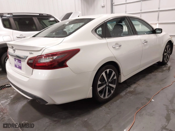 2017 Nissan Altima 2.5 SR with VIN 1N4AL3AP5HC265540, listed as a IAAI auction lot 41284731 with 125,504 mi miles. Bid and sale history available at carsss.com. Image 4.