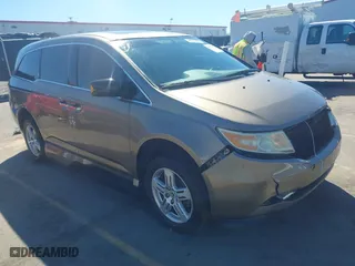 2013 Honda Odyssey Touring with VIN 5FNRL5H96DB066008, listed as a IAAI auction lot 41734055 with 120,292 mi miles. Bid and sale history available at carsss.com. Image 1.