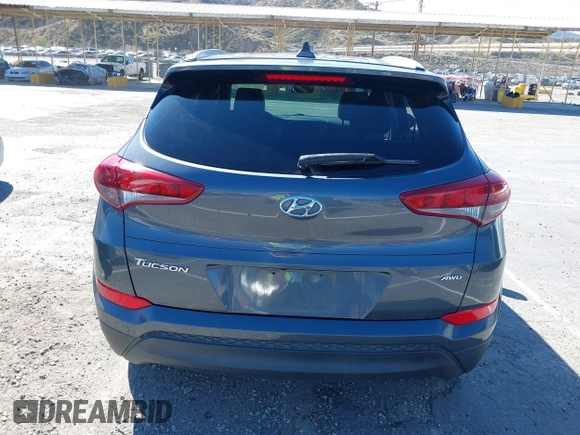 2018 Hyundai Tucson SEL with VIN KM8J3CA42JU618764, listed as a IAAI auction lot 41677046 with 127,980 mi miles. Bid and sale history available at carsss.com. Image 16.