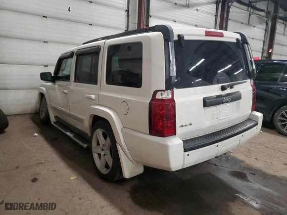 2010 Jeep Commander Sport with VIN 1J4RG4GK3AC156707, listed as a Copart auction lot 47821965 with 153,615 mi miles and Salvage Title. Bid and sale history available at carsss.com. Image 2.