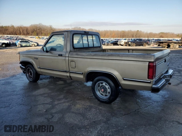 1989 Ford Ranger XL with VIN 1FTCR10AXKUC35082, listed as a Copart auction lot 42209825 with 754,095 mi miles and Salvage title. Bid and sale history available at DreamBid. Image 2.