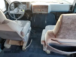 1986 GMC Safari z VIN 1GDDM15Z1GB521872, wystawiony jako Copart lot #87655995 z przebiegiem 30 889 mil mil oraz Szkody całkowita. Historia ofert i sprzedaży dostępna na DreamBid. Obrazek 8.