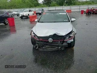 2017 Volkswagen GTI S z VIN 3VW547AU3HM068223, wystawiony jako Copart lot #57876795 z przebiegiem 96 095 mil mil oraz Szkoda całkowita • Salvage title. Historia ofert i sprzedaży dostępna na DreamBid. Obrazek 13.