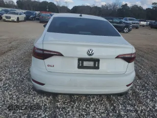 2019 Volkswagen Jetta GLI S с VIN 3VW5T7BU3KM201748, выставлен на аукционе Copart как лот 43240815 с пробегом 85 682 миль миль и Списание • Salvage title. История ставок и продаж доступна на DreamBid. Изображение 6.