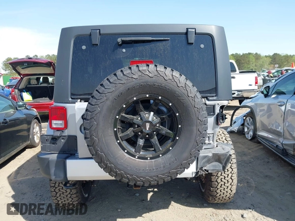 2015 Jeep Wrangler Unlimited Sahara with VIN 1C4BJWEG2FL558860, listed as a IAAI auction lot 41937360 with 113,627 mi miles. Bid and sale history available at carsss.com. Image 17.