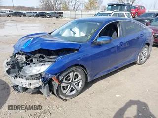2018 Honda Civic Sedan LX with VIN 19XFC2F53JE019635, listed as a IAAI auction lot 41537152 with 74,958 mi miles. Bid and sale history available at carsss.com. Image 2.