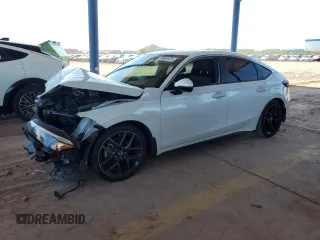 2023 Honda Civic Sport Touring z VIN 19XFL1H86PE017548, wystawiony jako Copart lot #59963425 z przebiegiem Nie podano mil oraz Szkoda całkowita • Salvage title. Historia ofert i sprzedaży dostępna na DreamBid. Obrazek 1.