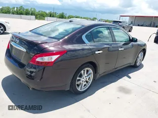 2011 Nissan Maxima SV with VIN 1N4AA5AP5BC855939, listed as a IAAI auction lot 42600437 with 211,716 mi miles and . Bid and sale history available at DreamBid. Image 4.