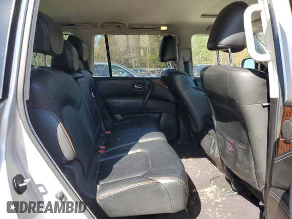 2018 Nissan Armada SL z VIN JN8AY2NC8JX500366, wystawiony jako Copart lot #52125215 z przebiegiem 132 818 mil mil oraz Szkoda całkowita • Salvage title. Historia ofert i sprzedaży dostępna na DreamBid. Obrazek 11.