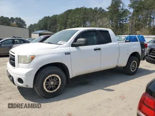 2010 Toyota Tundra 4WD Truck with VIN 5TFUY5F1XAX123787, listed as a Copart auction lot 54447555 with 242,821 mi miles and Clean Title. Bid and sale history available at carsss.com. Image 1.