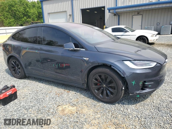 2016 Tesla Model X 70D z VIN 5YJXCBE23GF005295, wystawiony jako Copart lot #51034005 z przebiegiem 130 325 mil mil oraz Szkody całkowita. Historia ofert i sprzedaży dostępna na DreamBid. Obrazek 4.