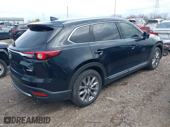 2020 Mazda CX-9 Grand Touring with VIN JM3TCBDY3L0419049, listed as a IAAI auction lot 41948393 with 70,163 mi miles and . Bid and sale history available at DreamBid. Image 4.