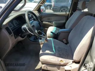 2000 Toyota 4Runner SR5 z VIN JT3GN86R0Y0154518, wystawiony jako Copart lot #60098695 z przebiegiem 174 071 mil mil oraz Szkoda całkowita • Salvage title. Historia ofert i sprzedaży dostępna na DreamBid. Obrazek 7.