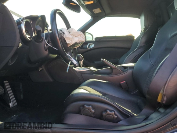 2014 Nissan 370Z Touring with VIN JN1AZ4FH3EM621279, listed as a Copart auction lot 52284814 with 60,479 mi miles and Salvage Title. Bid and sale history available at DreamBid. Image 7.