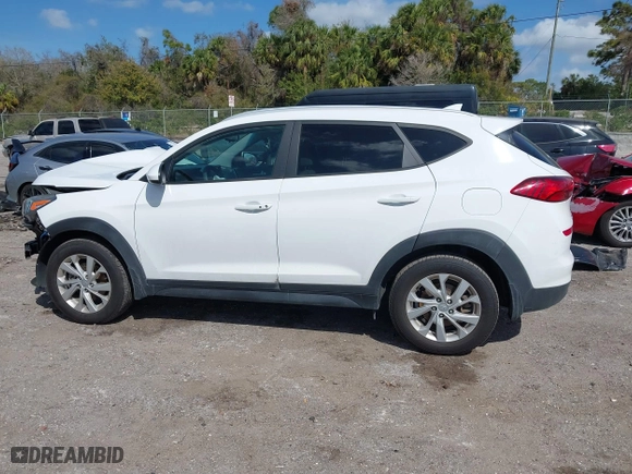 2019 Hyundai Tucson Value with VIN KM8J33A43KU065995, listed as a IAAI auction lot 41720471 with 95,732 mi miles. Bid and sale history available at carsss.com. Image 14.