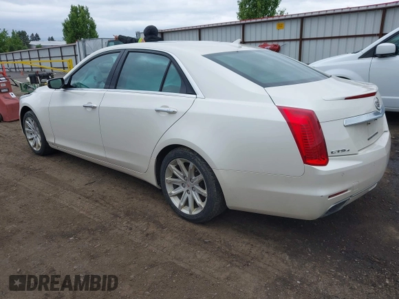 2014 Cadillac CTS Luxury AWD with VIN 1G6AX5S3XE0184524, listed as a IAAI auction lot 42260852 with 139,667 mi miles and . Bid and sale history available at DreamBid. Image 3.