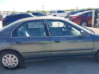 1996 Honda Accord LX with VIN 1HGCD5633TA286104, listed as a IAAI auction lot 42004112 with 186,586 mi miles and . Bid and sale history available at carsss.com. Image 13.