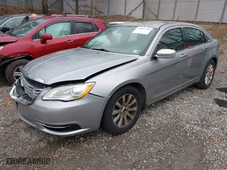 2014 Chrysler 200 Touring with VIN 1C3CCBBG8EN115390, listed as a IAAI auction lot 40907758 with 141,267 mi miles. Bid and sale history available at carsss.com. Image 18.