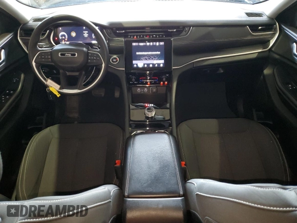 2023 Jeep Grand Cherokee Laredo with VIN 1C4RJHAG7P8866871, listed as a Copart auction lot 58341235 with 48,737 mi miles and Salvage title. Bid and sale history available at DreamBid. Image 8.