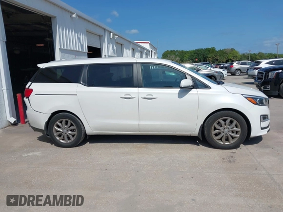 2021 Kia Sedona LX with VIN KNDMB5C12M6661917, listed as a IAAI auction lot 42129682 with 80,321 mi miles and . Bid and sale history available at carsss.com. Image 13.