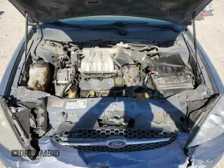 2000 Ford Taurus SE with VIN 1FAFP53U3YG259124, listed as a Copart auction lot 77363344 with 154,889 mi miles and Salvage Title. Bid and sale history available at DreamBid. Image 12.