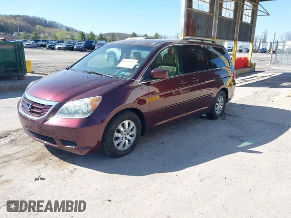 2009 Honda Odyssey EX-L with VIN 5FNRL38619B040594, listed as a IAAI auction lot 42037189 with 189,677 mi miles. Bid and sale history available at carsss.com. Image 2.