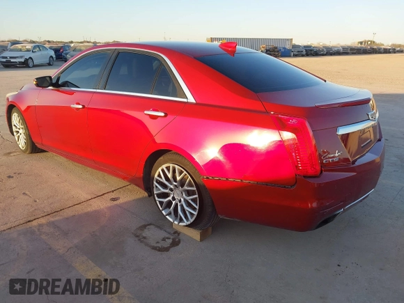 2015 Cadillac CTS RWD with VIN 1G6AP5SX3F0121169, listed as a IAAI auction lot 41165458 with 149,582 mi miles and . Bid and sale history available at DreamBid. Image 3.