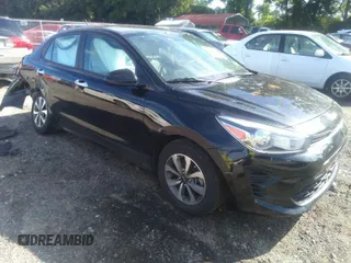 2023 Kia Rio S with VIN 3KPA24AD5PE531705, listed as a IAAI auction lot 39817112 with 73,997 mi miles. Bid and sale history available at carsss.com. Image 1.