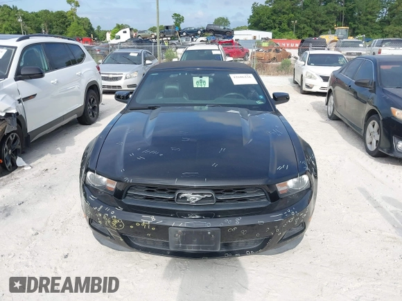 2012 Ford Mustang V6 z VIN 1ZVBP8EM4C5276765, wystawiony jako IAAI lot #42606236 z przebiegiem 129 111 mil mil oraz . Historia ofert i sprzedaży dostępna na DreamBid. Obrazek 12.