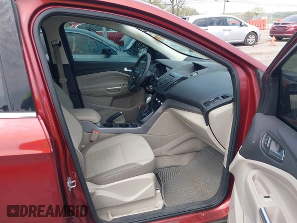 2014 Ford Escape SE with VIN 1FMCU0GX2EUB60526, listed as a IAAI auction lot 42060469 with 128,796 mi miles. Bid and sale history available at carsss.com. Image 5.