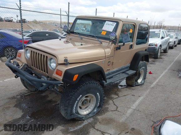1999 Jeep Wrangler Sahara with VIN 1J4FY49S6XP437964, listed as a IAAI auction lot 41947995 with 118,566 mi miles. Bid and sale history available at carsss.com. Image 2.