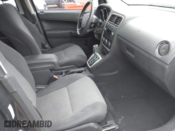2011 Dodge Caliber Heat with VIN 1B3CB5HA7BD110672, listed as a IAAI auction lot 41709487 with 59,679 mi miles and . Bid and sale history available at DreamBid. Image 5.