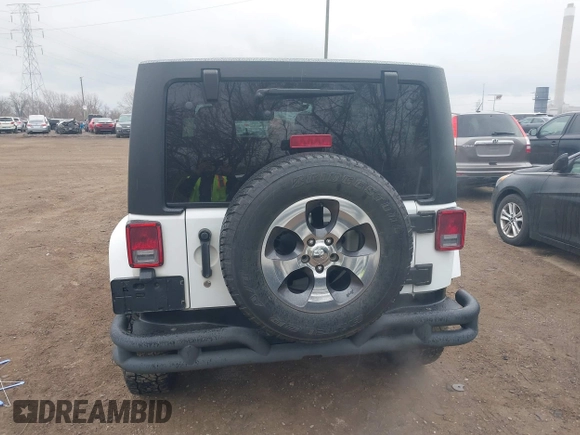 2017 Jeep Wrangler Unlimited 75th Anniversary z VIN 1C4BJWEG9HL684152, wystawiony jako IAAI lot #41880074 z przebiegiem 91 847 mil mil oraz . Historia ofert i sprzedaży dostępna na DreamBid. Obrazek 16.