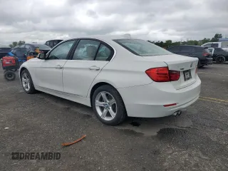 2015 BMW 3 Series 328i xDrive with VIN WBA3B5C55FF959442, listed as a Copart auction lot 57566895 with 97,628 mi miles and Clean title. Bid and sale history available at DreamBid. Image 2.