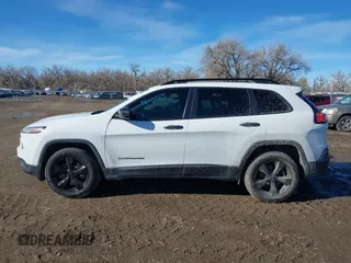 2017 Jeep Cherokee Sport with VIN 1C4PJMAS8HW633678, listed as a IAAI auction lot 41669785 with 99,309 mi miles and . Bid and sale history available at DreamBid. Image 14.