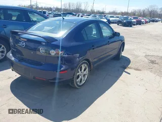 2009 Mazda Mazda3 i Touring Value with VIN JM1BK32F191193501, listed as a IAAI auction lot 42042711 with 165,234 mi miles. Bid and sale history available at carsss.com. Image 4.