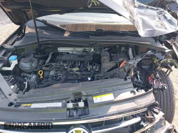 2022 Volkswagen Tiguan SE with VIN 3VV2B7AXXNM060140, listed as a IAAI auction lot 40300638 with 25,955 mi miles and . Bid and sale history available at DreamBid. Image 10.