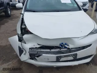 2016 Toyota Prius Two with VIN JTDKBRFU2G3503863, listed as a IAAI auction lot 42035013 with 118,930 mi miles. Bid and sale history available at carsss.com. Image 18.