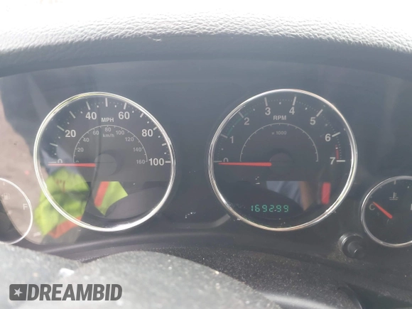 2013 Jeep Wrangler Unlimited Sport with VIN 1C4HJWDG7DL516077, listed as a IAAI auction lot 42521985 with 169,299 mi miles and . Bid and sale history available at DreamBid. Image 7.