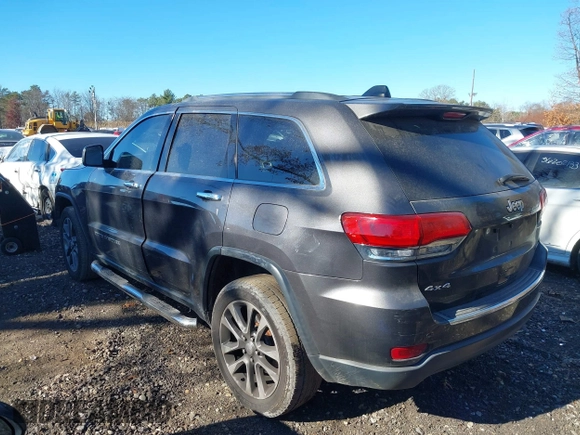 2018 Jeep Grand Cherokee Limited with VIN 1C4RJFBG6JC246293, listed as a IAAI auction lot 40846527 with 114,544 mi miles and . Bid and sale history available at DreamBid. Image 14.