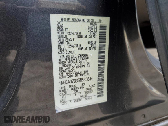 2005 Nissan Titan SE with VIN 1N6BA07B35N553844, listed as a Copart auction lot 45569885 with 156,912 mi miles and Salvage Title. Bid and sale history available at DreamBid. Image 12.