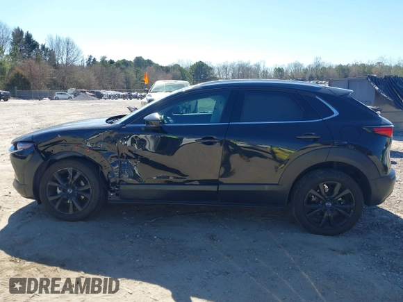 2022 Mazda CX-30 2.5 Turbo Premium Package with VIN 3MVDMBDY4NM446866, listed as a IAAI auction lot 41704578 with 24,360 mi miles. Bid and sale history available at carsss.com. Image 15.