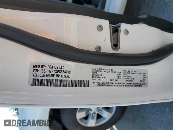 2023 Ram 1500 Tradesman with VIN 1C6RR7FTXPS588759, listed as a Copart auction lot 71082284 with 31,945 mi miles and Salvage title. Bid and sale history available at DreamBid. Image 13.