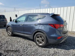 2017 Hyundai Santa Fe 2.4L with VIN 5NMZUDLB1HH005770, listed as a Copart auction lot 60734225 with 58,597 mi miles and Clean title. Bid and sale history available at DreamBid. Image 2.