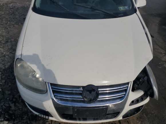 2006 Volkswagen Jetta z VIN 3VWSG81K76M742630, wystawiony jako Copart lot #54420955 z przebiegiem Nie podano mil oraz Szkoda całkowita • Salvage title. Historia ofert i sprzedaży dostępna na DreamBid. Obrazek 11.