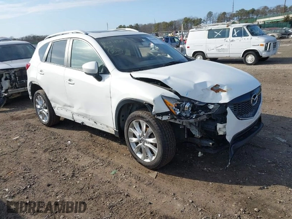 2014 Mazda CX-5 Grand Touring with VIN JM3KE4DY7E0425201, listed as a IAAI auction lot 41803597 with 118,867 mi miles. Bid and sale history available at carsss.com. Image 1.