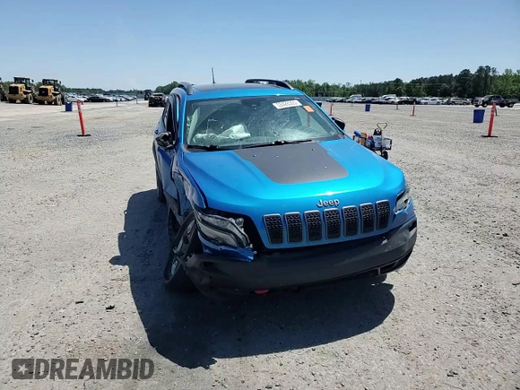 2019 Jeep Cherokee Trailhawk Elite z VIN 1C4PJMBXXKD309306, wystawiony jako Copart lot #53428305 z przebiegiem 99 448 mil mil oraz Szkoda całkowita • Salvage title. Historia ofert i sprzedaży dostępna na DreamBid. Obrazek 11.